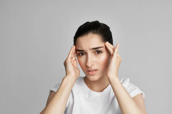 Woman with headache health problems migraine depression Stock Image