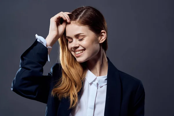 woman in business suit fun posing isolated background