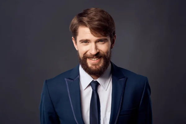 The man in a suit jacket with tie isolated background