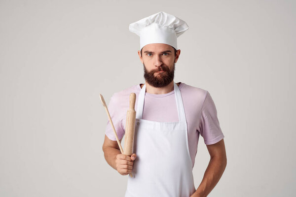 chef in uniform kitchenware cooking work