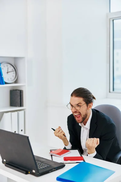 Businessman phone laptop work emotions technologies — Stock Photo, Image