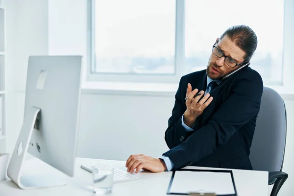 Businessman emotions work head documents computer — Stock Photo, Image