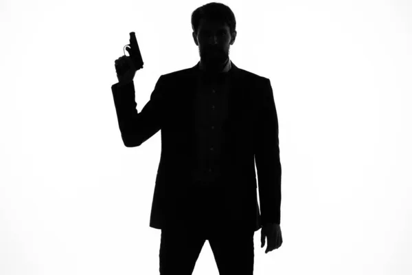 Businessmen gun in the hands of the emotions silhouette isolated background — Stock Photo, Image