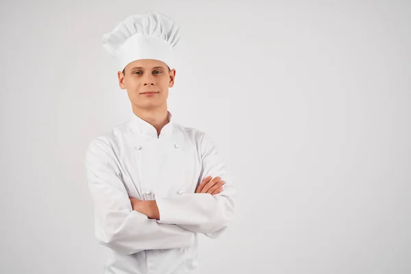 Uomo in uniforme chef self-confidence professionale ristorante luce sfondo — Foto Stock