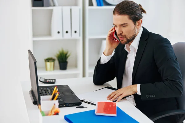 Manager office work documents with a phone in hand technology — Stock Photo, Image