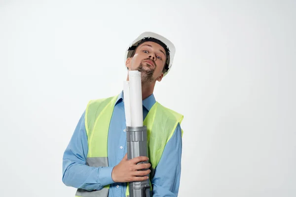 Hombre en la construcción uniforme planos constructor profesión de trabajo — Foto de Stock