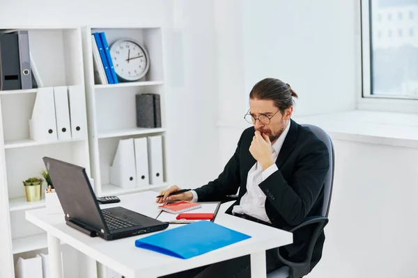 Businessman work in the office in front of a laptop executive — Stock Photo, Image