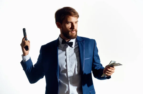 Hombre en un traje finanzas éxito luz fondo — Foto de Stock