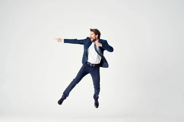 Man in suit manager office emotions motion light background — Stock Photo, Image