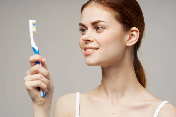 Cheerful woman in white t-shirt dental hygiene health care studio lifestyle — Stock Photo, Image