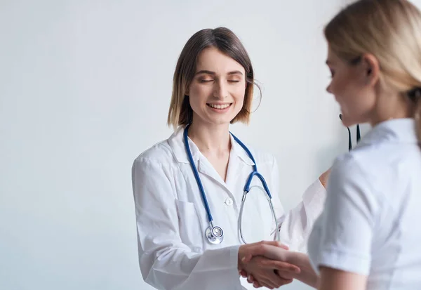 Nurse health diagnostics analysis hospital light background — Stock Photo, Image