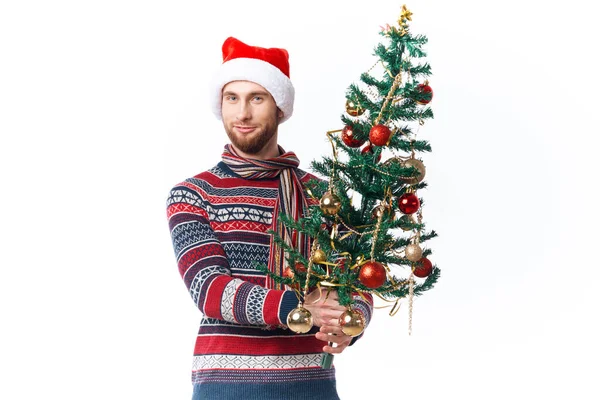 Jóképű férfi újévi ruhák dekoráció karácsony elszigetelt háttér — Stock Fotó