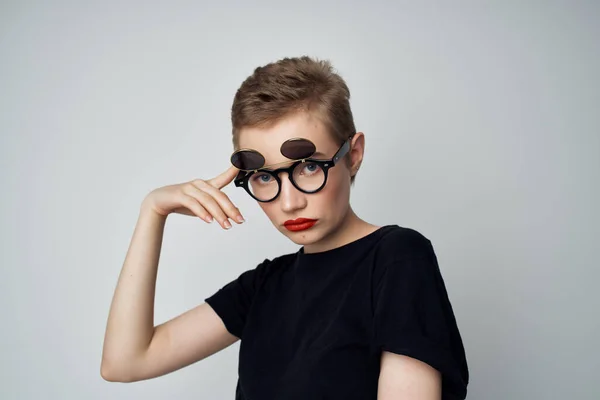 short haired woman hand gesture Red lips glamor light background