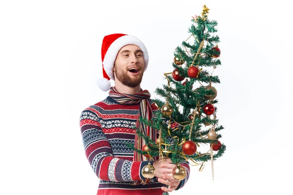 Schöner Mann mit Weihnachtsmütze Weihnachtsdekoration Feiertag Neujahr isoliert Hintergrund — Stockfoto