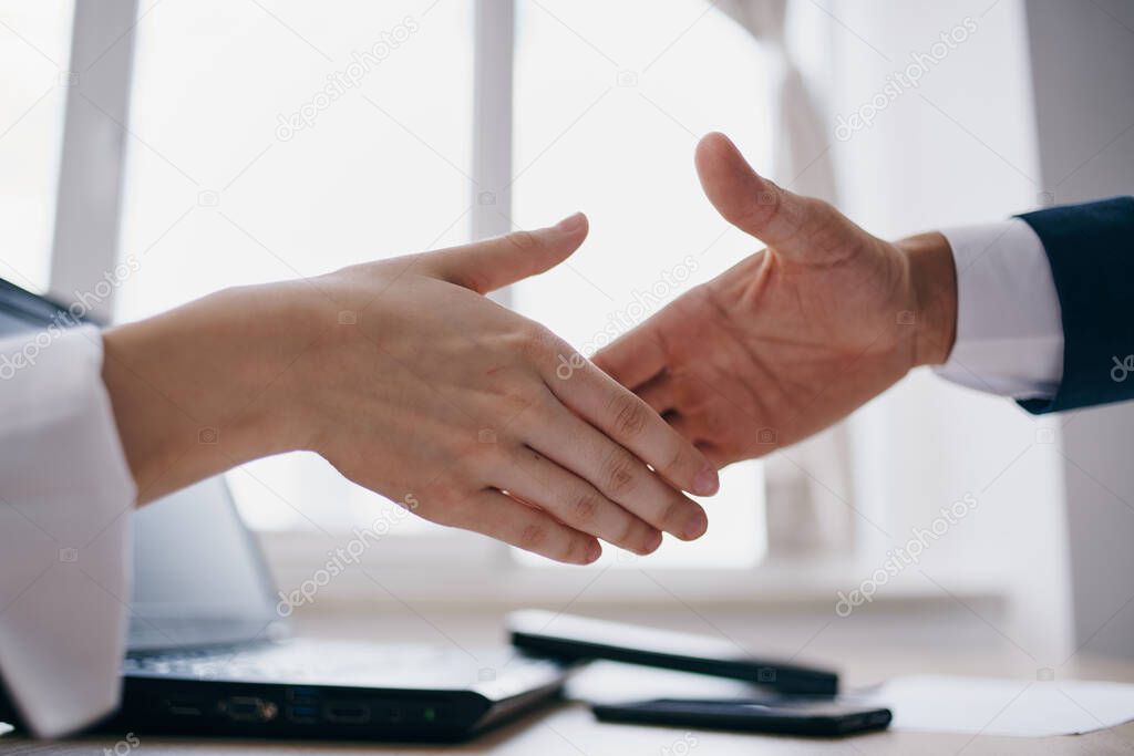 colleagues at work successful deal desire hands conclusion of a contract