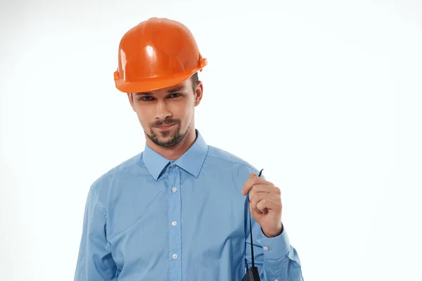 Man in construction uniform blueprints builder isolated background — Stock Photo, Image