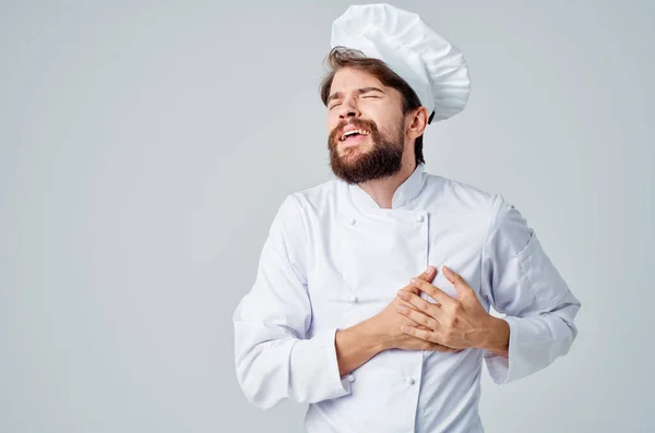 Maschio cuoco ristorante fornitura di servizi sfondo chiaro — Foto Stock