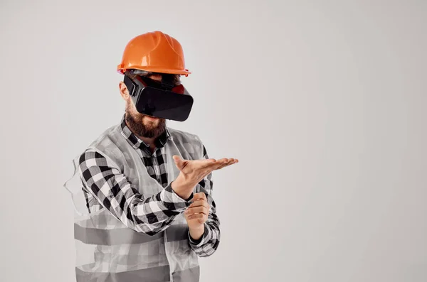 engineer in virtual reality glasses innovation light background