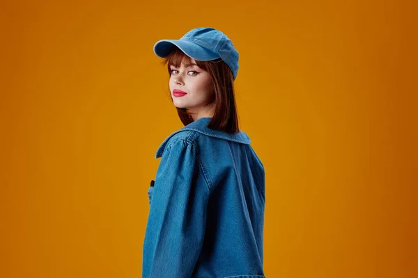 Pretty woman stylish denim clothing posing color background unaltered — Stockfoto