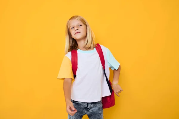 Cute schoolgirl blonde hair school backpack posing isolated background — Fotografia de Stock
