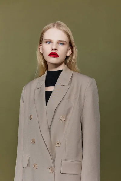 Woman with bright red lips in coat fashion cropped view — Stock Photo, Image