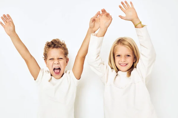 Cheerful children dance gesticulate with their hands lifestyle — Fotografia de Stock