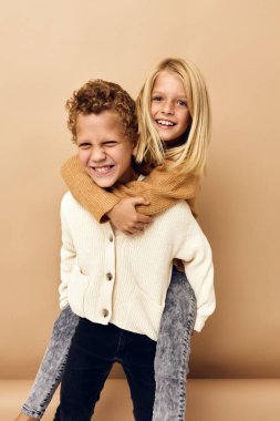 children together in sweaters fun casual wear Studio Lifestyle