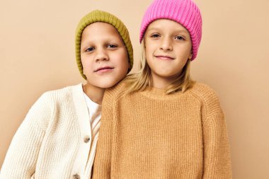 portrait of cute children hugs laughter friendship Studio emotions