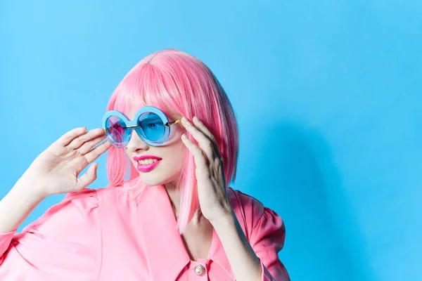 Portrait of a woman in pink wig pink dress Red lips studio model unaltered —  Fotos de Stock