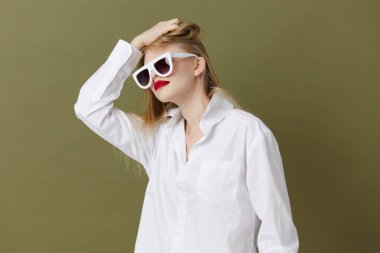 fashionable woman red lips fashion glasses studio model unaltered