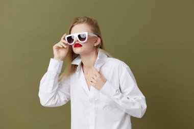fashionable woman red lips fashion glasses studio model unaltered