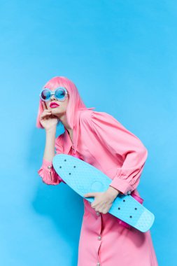 glamorous woman in sunglasses in studio psing. High quality photo