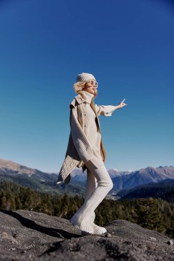 young woman posing on  nature in  autumn. High quality photo