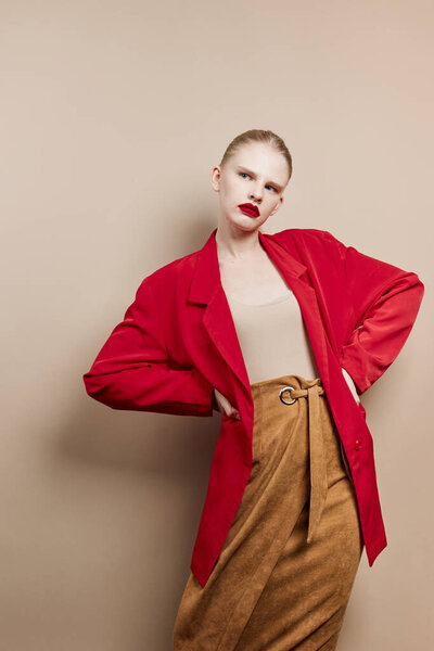 glamorous woman makeup in red jacket isolated background
