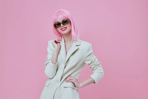 Positive young woman modern style pink hair sunglasses color background unaltered — Φωτογραφία Αρχείου