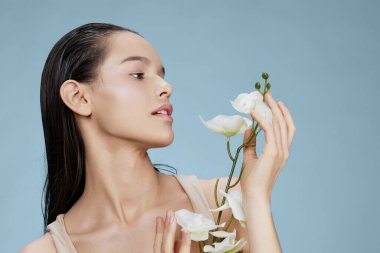 Yüze yakın kadın orkidesi Kozmetik Temiz cilt hassasiyeti Yakın yaşam tarzı