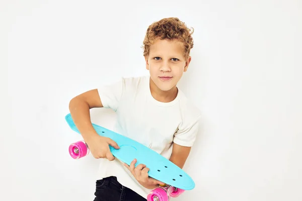 Portrait of young smiling kid casual street style light background — Stock Photo, Image