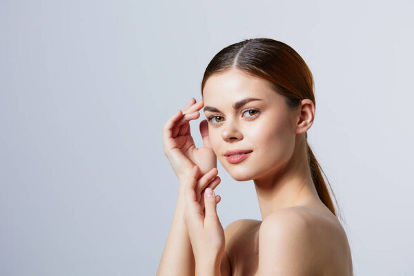 young woman smiling woman bare shoulders clean skin charm isolated background