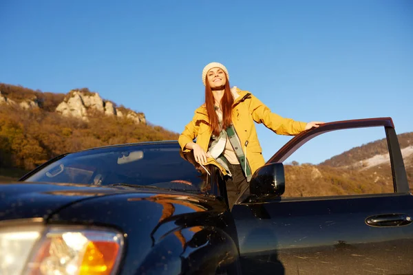 woman traveler cars trip to mountains landscape Trip Fresh air