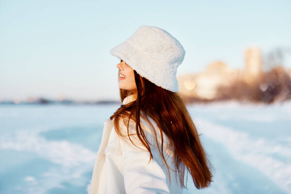 woman red hair snow field winter clothes Fresh air