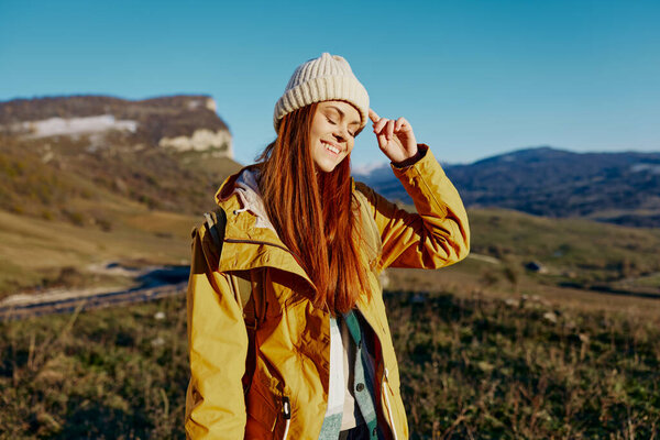 woman traveler admiring the landscape mountains nature relaxation