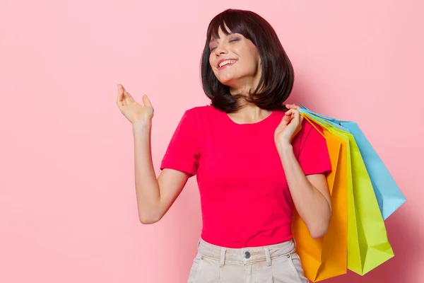 Woman holding colorful bags shopping Lifestyle fashion — Stock Photo, Image