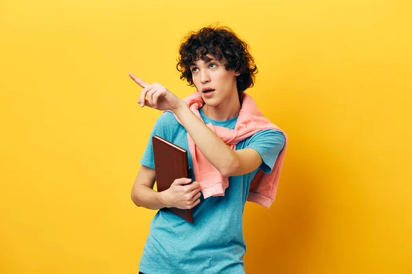 student with a book college learning pink jacket isolated backgrounds. High quality photo