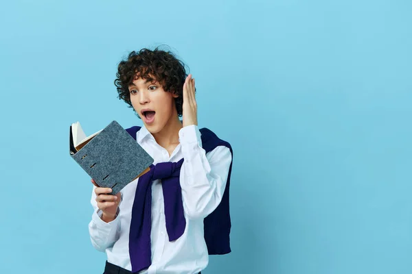 curly guy with a book college learning jacket isolated backgrounds