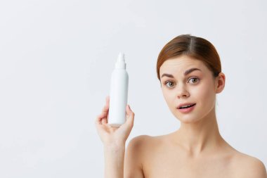 Güzel kadın losyonu kavanozu temiz cilt bakımı yakın çekim yaşam tarzı