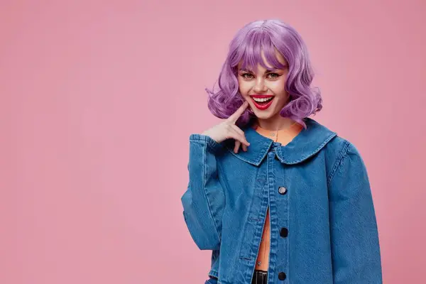 Pretty young female purple hairstyle red lips denim jacket fun pink background unaltered — Stock Photo, Image