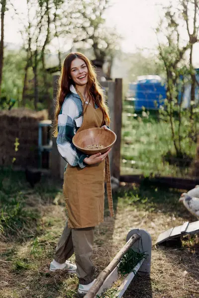 Young Woman Works Farm Pours Fresh Feed Bowl Feed Chickens — Stock Photo, Image