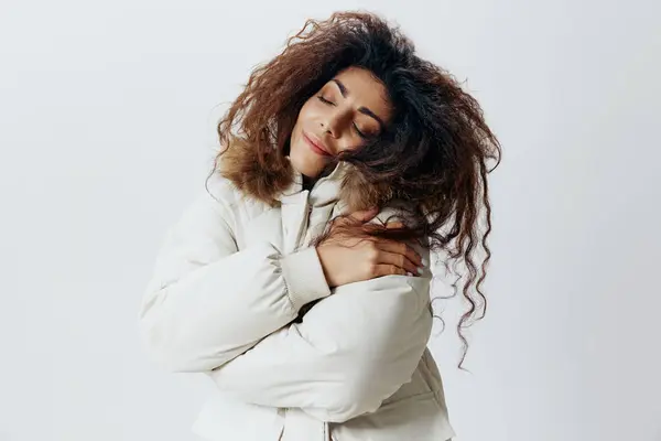 Happy Smiling Curly Pretty Latin Woman Hugging Her Enjoyed Beige — Foto de Stock