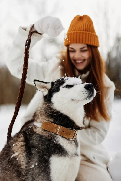 woman with dog winter landscape walk friendship fresh air. High quality photo
