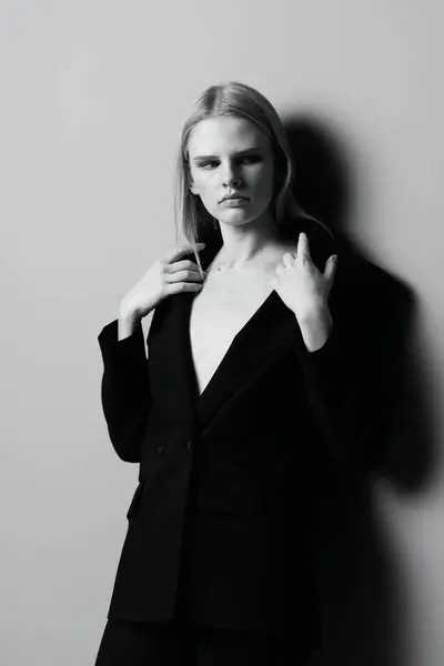 Stylish Woman Holds Jacket Collar While Posing Studio Fashionable Stylish — Stock Photo, Image